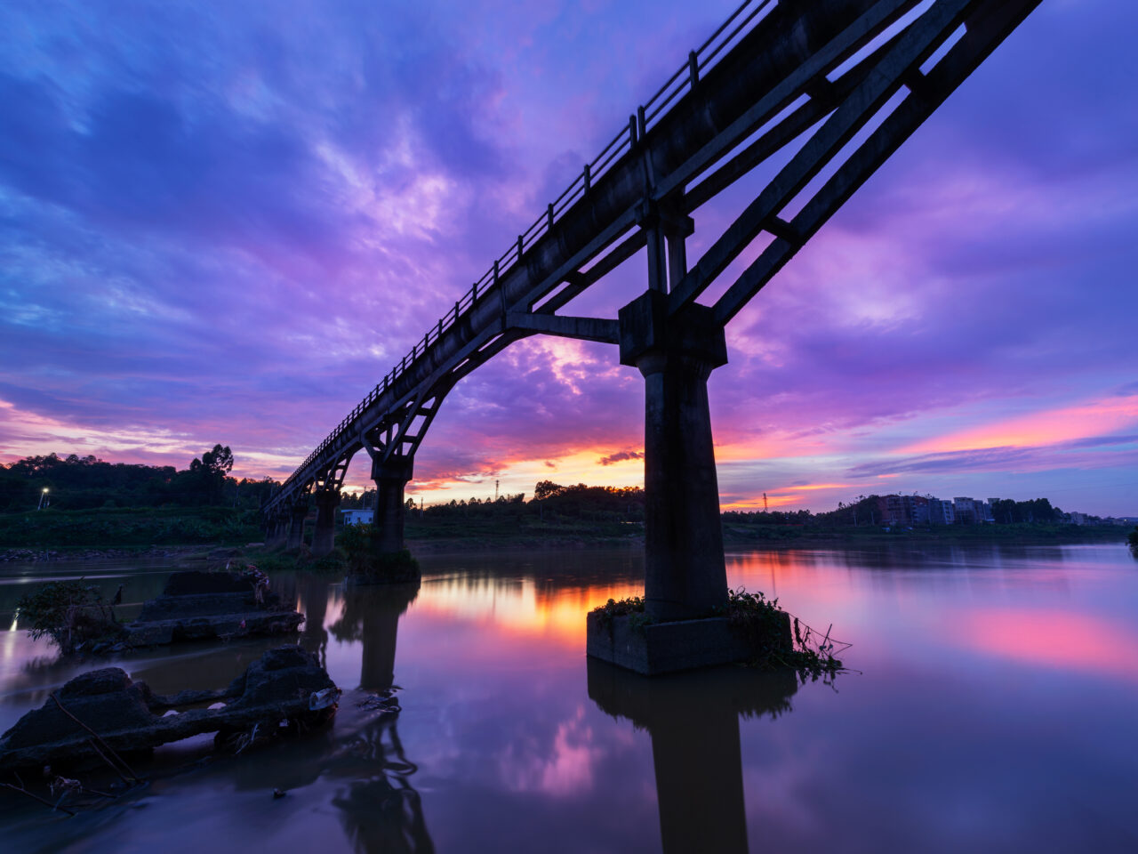 Dusk view of the bridge over the river